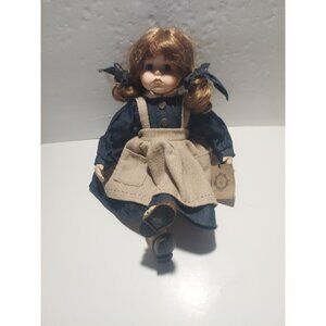 The Boyds Collection Porcelain Doll In Pig Tails